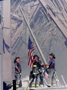 Firemen raising flag at World Trade Center post 9-11